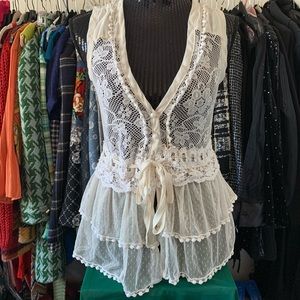 Lace and mesh ivory sleeveless button up top in size small, Used one time.